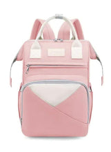 Pink baby travel backpack with front pocket and zip, top handle and shoulder straps