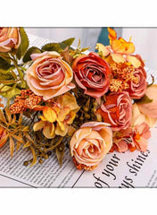 Pink faux rose bunch for home decor with delicate green leaves and orange accent flowers by Huitich