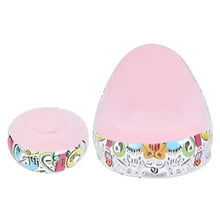 Pink inflatable lounge chair and round footrest with colorful graphic print trim