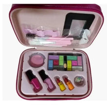 Open pink makeup kit case with mirror, brushes, and colorful compact cosmetics