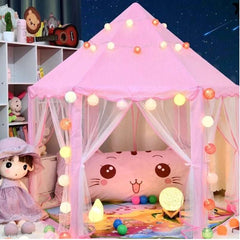 Huitich pink princess tent for girls with sheer curtains and decorative string lights in a playroom