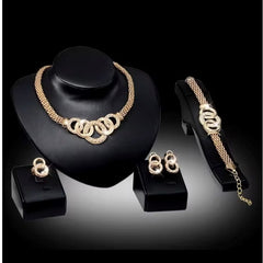 Four Piece Gold Jewelry Set - Necklace, Bracelet, Earrings, and Ring