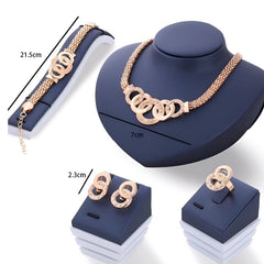 Four Piece Gold Jewelry Set - Necklace, Bracelet, Earrings, and Ring