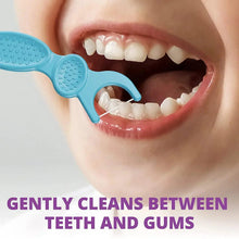 Child using a blue dental flosser between teeth and gums
