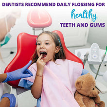 Child dental flossing with flossers for healthy teeth and gums
