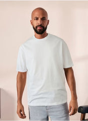 Huitich plain white t shirt for men XL worn by male model with beard and light wash jeans