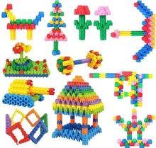 Colorful plastic brick construction set showing multiple built figures and buildings