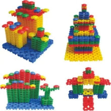 Colorful plastic brick construction set with four built house and tower models