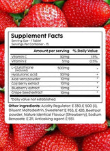 Supplement facts label for strawberry-flavored effervescent tablets with strawberry background