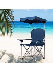 Huitich portable beach chair with canopy in navy blue on sandy beach with ocean background