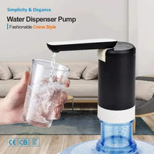 Electric water dispenser pump dispensing into a clear drinking cup