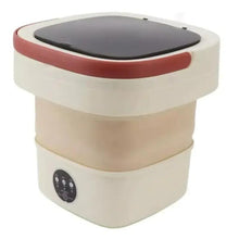 Portable foldable washing machine with dark-lid top and red rim, front control panel