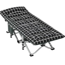 Folding camping cot with black grid-pattern fabric and silver folding frame