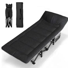 Portable camping bed with dark fabric mattress and folding metal legs