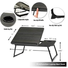Portable reading/laptop desk with tilted platform, support legs, and side cup holder