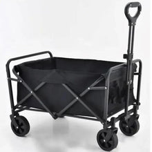 Foldable portable wagon with black fabric bed and four swivel wheels