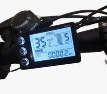Electric bike display screen showing speed and odometer on the handlebar