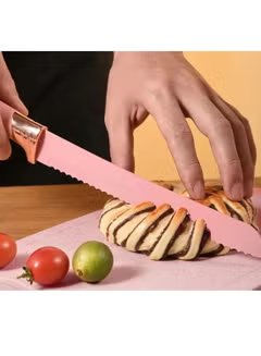 Huitich 19-piece premium cooking set UAE with serrated knife slicing bread on a wooden board