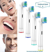 Pack of replacement toothbrush heads on white handles, blue and green bristles