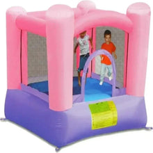 Inflatable bounce house with arched entrance and slide, pink-and-purple