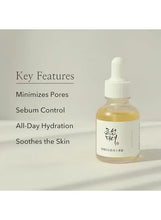 Facial serum bottle with white dropper; text lists pore minimizer and all-day hydration