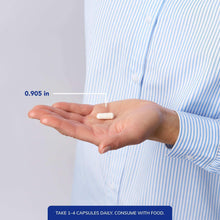 Magnesium glycinate capsule in open palm with 0.905 in size marker