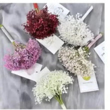 Set of artificial flower bouquets with white, purple, red, and pale green blooms