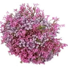 Purple artificial flower bouquet with dense small blossoms and stems