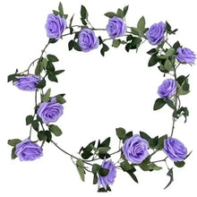 Purple artificial rose wall hanging wreath with green leaves and curling vine border