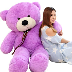 Huitich purple teddy bear 60cm sitting next to a woman in a light blue dress with white stars
