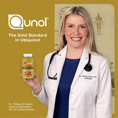 Female cardiologist holding bottle of Qunol Ubiquinol CoQ10 200mg softgels against gold backdrop