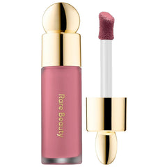 Rare Beauty Soft Pinch Liquid Blush in mauve pink shade with gold cap and applicator