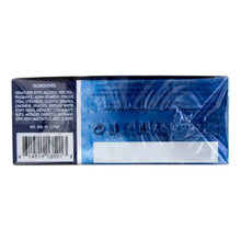 Perfume box back panel with ingredients list and barcode on blue surface