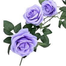 Artificial lavender rose wall garland with green leaves and curved stems