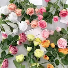 Mixed-color artificial roses with green leaves and stems