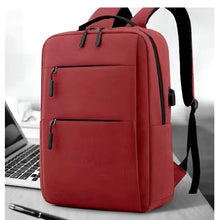 Red waterproof travel backpack with front zipper pockets and adjustable shoulder straps