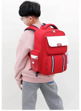 Red backpack-style trolley school bag with white front panel and side pockets
