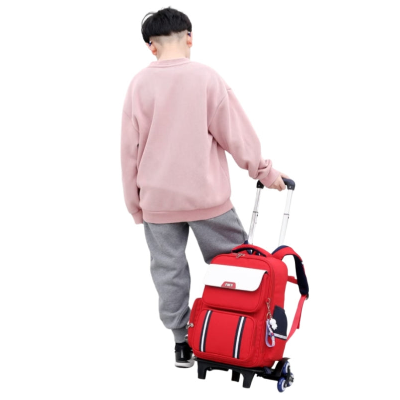 Kid pulling red six wheel trolley school bag by Huitich with padded backpack straps and front pockets