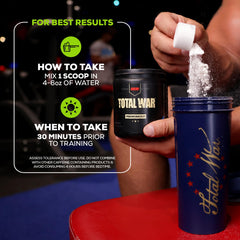 Redcon1 Total War pre workout UAE jar and scoop pouring powder into Total War shaker with usage instructions