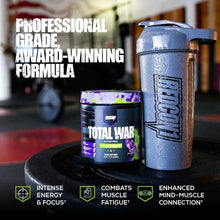 Total War pre workout tub with blue metal shaker bottle, product and shaker on desk