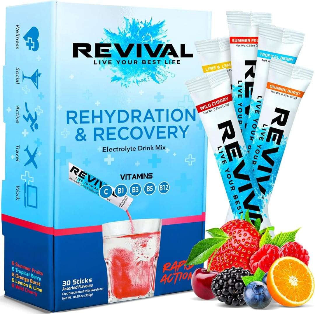 Revival Shots Rehydration Recovery electrolyte drink with fruit sticks and glass of pink beverage electrolyte hydration powder UAE