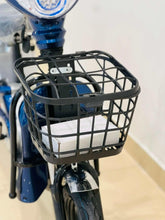 Electric scooter front basket and fork, black metal grille on blue frame