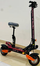 Electric scooter-style electric bike side view with red graphics, black frame and orange wheels