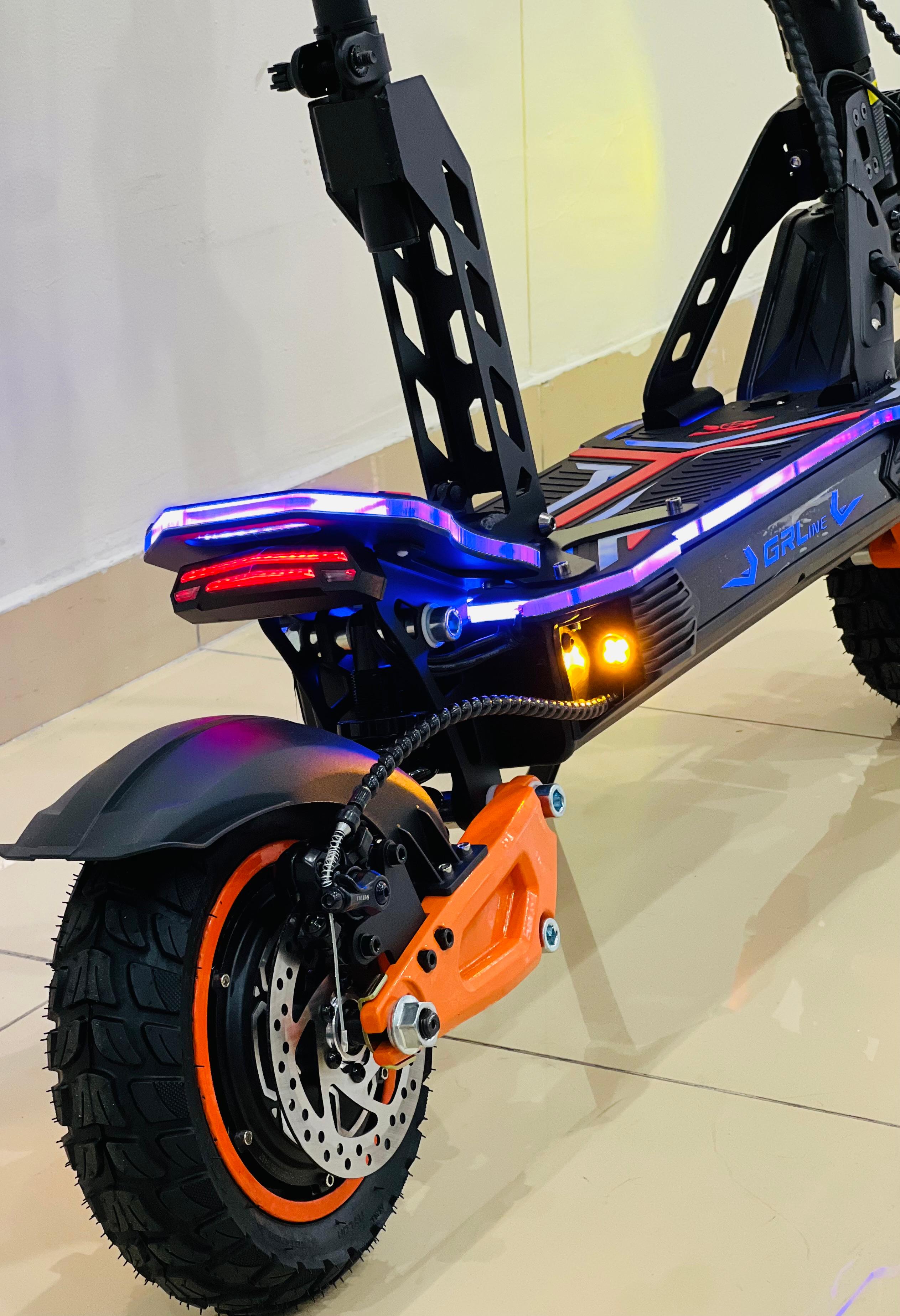 Close-up of RohaN Wings GR-Line G5 electric bike with colorful LED lights and a sturdy tire