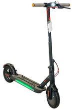 Black electric scooter with glowing green LED deck strip and headlight