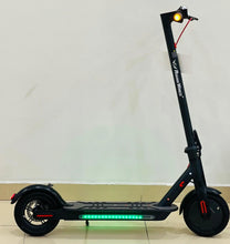 Black electric scooter side view with wheel and amber front light