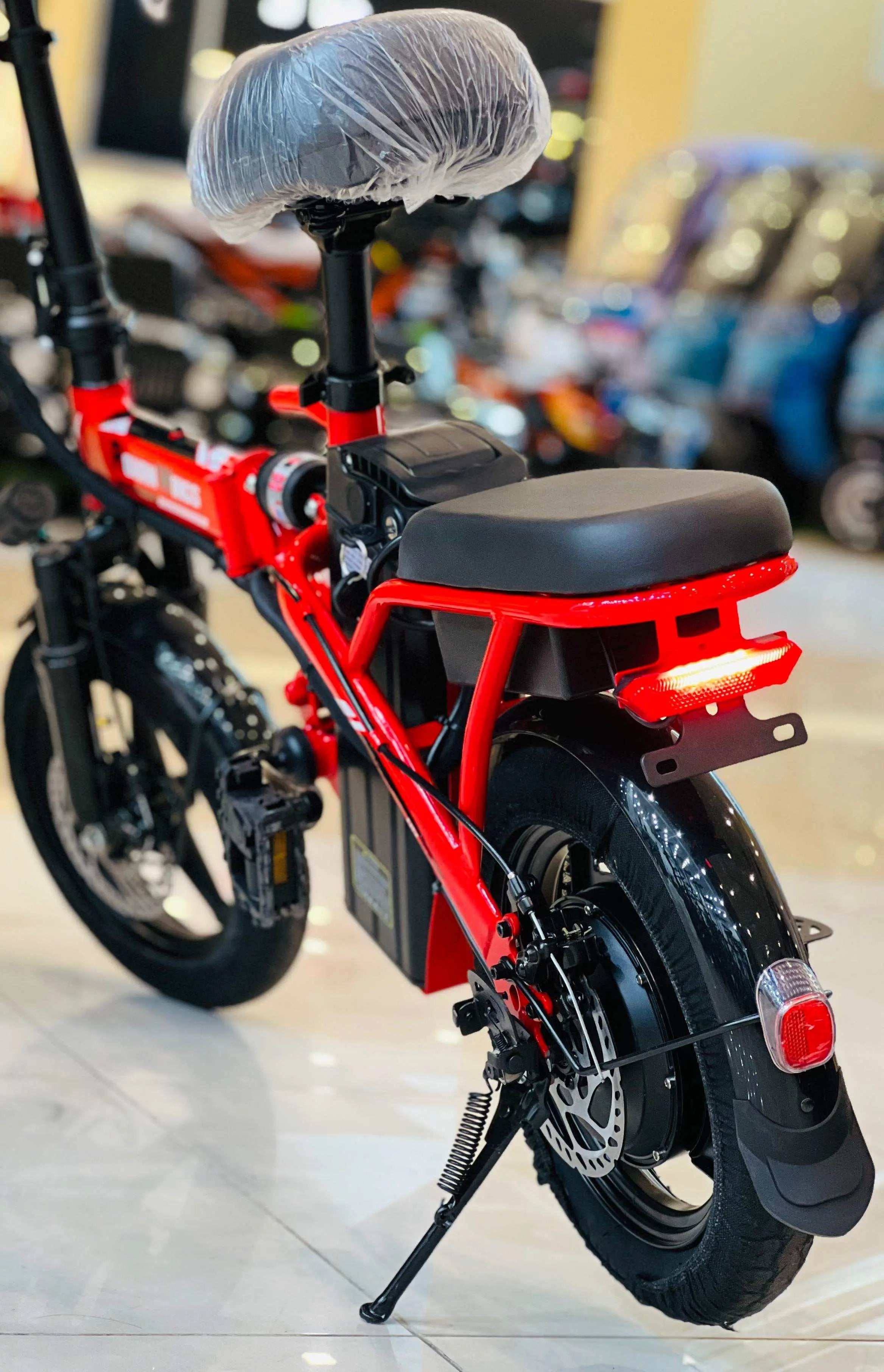 RohaN Wings KQ02 electric scooter UAE shown in red with a sleek design and comfortable seating
