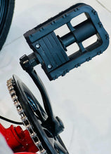 Electric scooter footboard with textured rubber and rear wheel