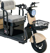 Beige and black electric scooter with round headlight, cushioned seat, and front basket