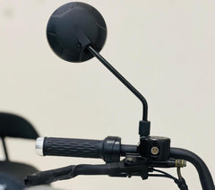 Close-up of RohaN Wings X8 electric scooter UAE handlebar with ergonomic grips and round mirror